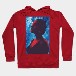 a red silhouette of a proud woman in the ocean Hoodie